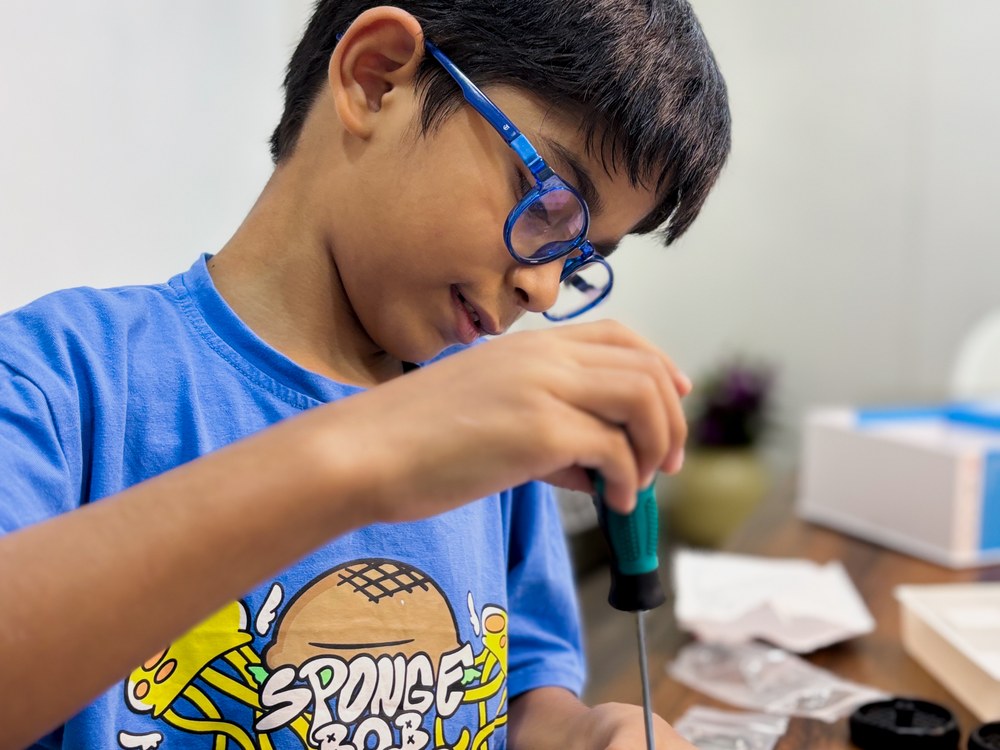 A Cubo Academy child at the Builder stage